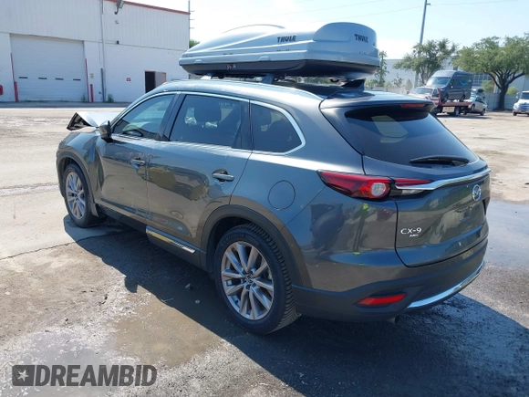2022 Mazda CX-9 Grand Touring with VIN JM3TCBDY4N0618680, listed as a IAAI auction lot 40086806 with 34,142 mi miles and . Bid and sale history available at DreamBid. Image 3.