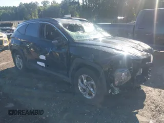 2022 Hyundai Tucson SEL z VIN 5NMJB3AE7NH137096, wystawiony jako IAAI lot #42545376 z przebiegiem 65 270 mil mil oraz . Historia ofert i sprzedaży dostępna na DreamBid. Obrazek 1.