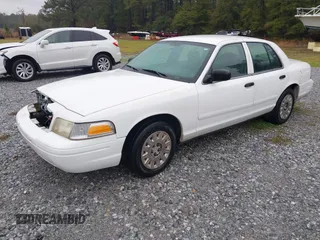2005 Ford Police Interceptor z VIN 2FAFP71W25X139210, wystawiony jako IAAI lot #41609177 z przebiegiem 114 755 mil mil oraz . Historia ofert i sprzedaży dostępna na DreamBid. Obrazek 17.
