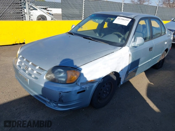 2004 Hyundai Accent GL with VIN KMHCG45C14U547954, listed as a IAAI auction lot 41350219 with 138,436 mi miles. Bid and sale history available at carsss.com. Image 2.