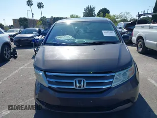 2011 Honda Odyssey EX-L with VIN 5FNRL5H68BB083492, listed as a IAAI auction lot 42087699 with 155,141 mi miles and . Bid and sale history available at carsss.com. Image 12.