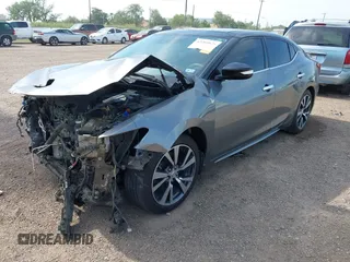 2016 Nissan Maxima SL z VIN 1N4AA6AP3GC392390, wystawiony jako IAAI lot #42260676 z przebiegiem 135 259 mil mil oraz . Historia ofert i sprzedaży dostępna na DreamBid. Obrazek 18.