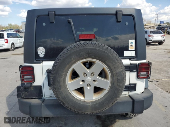2013 Jeep Wrangler Unlimited Sport z VIN 1C4BJWDG0DL690966, wystawiony jako Copart lot #50554615 z przebiegiem 101 383 mil mil oraz Szkoda całkowita • Salvage title. Historia ofert i sprzedaży dostępna na DreamBid. Obrazek 6.