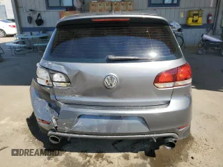 2013 Volkswagen GTI w/Conv & Sunroof z VIN WVWFD7AJ4DW031740, wystawiony jako Copart lot #70099084 z przebiegiem 130 193 mil mil oraz Szkoda całkowita • Salvage title. Historia ofert i sprzedaży dostępna na DreamBid. Obrazek 6.