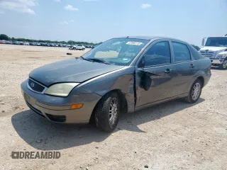 2007 Ford Focus S z VIN 1FAHP34N37W238380, wystawiony jako Copart lot #57886115 z przebiegiem 128 278 mil mil oraz Szkoda całkowita • Salvage title. Historia ofert i sprzedaży dostępna na DreamBid. Obrazek 1.