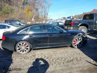 2015 Audi A6 3.0T Premium Plus with VIN WAUFGAFC3FN030194, listed as a IAAI auction lot 40944284 with 116,394 mi miles. Bid and sale history available at carsss.com. Image 13.