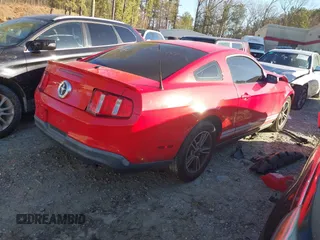 2012 Ford Mustang Premium with VIN 1ZVBP8AM0C5233157, listed as a IAAI auction lot 41580689 with 132,243 mi miles and . Bid and sale history available at DreamBid. Image 4.