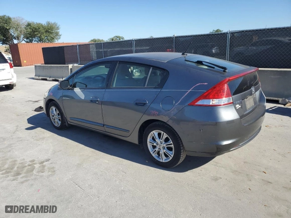 2011 Honda Insight EX with VIN JHMZE2H73BS012509, listed as a Copart auction lot 52590455 with 141,500 mi miles and Salvage Title. Bid and sale history available at carsss.com. Image 2.