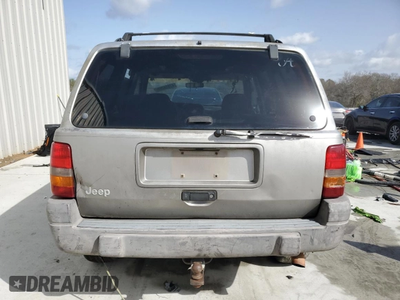 1998 Jeep Grand Cherokee Laredo with VIN 1J4FX58S1WC130492, listed as a Copart auction lot 47656265 with 0 mi miles and Salvage Title. Bid and sale history available at carsss.com. Image 6.