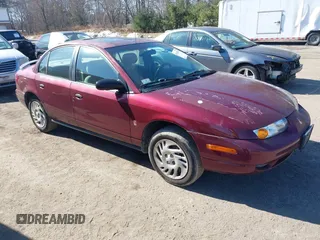 2002 Saturn SL with VIN 1G8ZF52852Z267004, listed as a IAAI auction lot 41760974 with 228,165 mi miles. Bid and sale history available at carsss.com. Image 1.