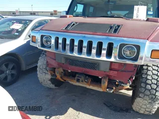 2003 Hummer H2 with VIN 5GRGN23U33H115187, listed as a IAAI auction lot 38374466 with 153,158 mi miles. Bid and sale history available at carsss.com. Image 6.