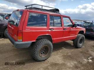 2000 Jeep Cherokee with VIN 1J4FF48S0YL113246, listed as a Copart auction lot 51861455 with 180,965 mi miles and Clean title. Bid and sale history available at DreamBid. Image 3.