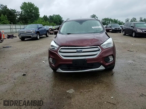 2018 Ford Escape Titanium z VIN 1FMCU0J93JUA70449, wystawiony jako Copart lot #59303245 z przebiegiem 165 907 mil mil oraz Szkoda całkowita • Salvage title. Historia ofert i sprzedaży dostępna na DreamBid. Obrazek 13.