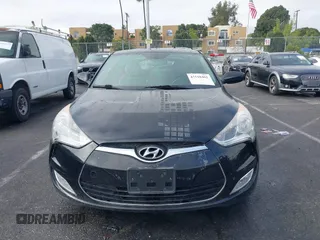 2013 Hyundai Veloster w/Gray Int with VIN KMHTC6AD6DU172892, listed as a IAAI auction lot 41518462 with 167,251 mi miles. Bid and sale history available at carsss.com. Image 6.
