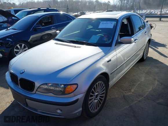 2003 BMW 3 Series 330xi with VIN WBAEW53493PN30296, listed as a IAAI auction lot 41429776 with 233,013 mi miles. Bid and sale history available at carsss.com. Image 2.