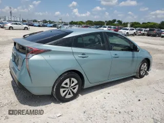 2017 Toyota Prius Two z VIN JTDKARFUXH3040343, wystawiony jako Copart lot #57870425 z przebiegiem 59 711 mil mil oraz Szkoda całkowita • Salvage title. Historia ofert i sprzedaży dostępna na DreamBid. Obrazek 3.