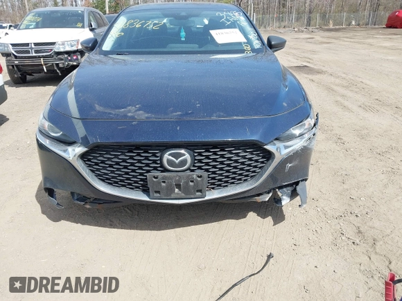 2021 Mazda 3 S with VIN 3MZBPAAL2MM253405, listed as a IAAI auction lot 41836752 with 63 mi miles and . Bid and sale history available at DreamBid. Image 16.