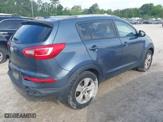 2012 Kia Sportage LX with VIN KNDPB3A27C7320227, listed as a IAAI auction lot 42109588 with 162,043 mi miles. Bid and sale history available at carsss.com. Image 4.