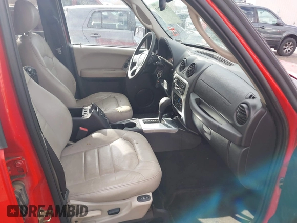 2004 Jeep Liberty Limited with VIN 1J4GL58KX4W323414, listed as a IAAI auction lot 41913205 with 180,014 mi miles. Bid and sale history available at carsss.com. Image 5.