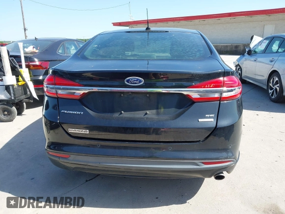 2017 Ford Fusion SE z VIN 3FA6P0HD6HR163041, wystawiony jako IAAI lot #42018701 z przebiegiem 124 271 mil mil oraz . Historia ofert i sprzedaży dostępna na DreamBid. Obrazek 17.