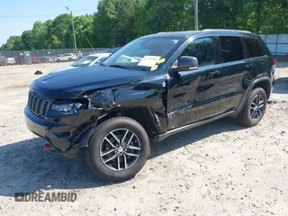 2017 Jeep Grand Cherokee Trailhawk with VIN 1C4RJFLG4HC940652, listed as a IAAI auction lot 42135489 with 102,593 mi miles and . Bid and sale history available at DreamBid. Image 2.