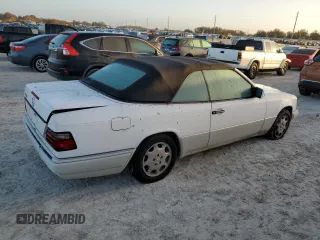 1995 Mercedes-Benz E Class with VIN WDBEA66E0SC275229, listed as a Copart auction lot 77391894 with 64,025 mi miles and Salvage Title. Bid and sale history available at carsss.com. Image 3.