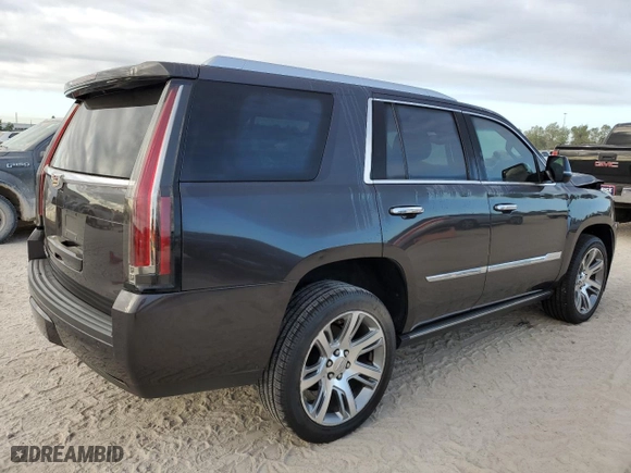 2015 Cadillac Escalade Premium with VIN 1GYS3NKJ2FR722538, listed as a Copart auction lot 77674394 with 130,718 mi miles and Salvage Title. Bid and sale history available at carsss.com. Image 3.