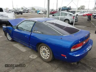 1990 Nissan 240SX z VIN JN1HS36P4LW126417, wystawiony jako IAAI lot #42065073 z przebiegiem 284 437 mil mil oraz . Historia ofert i sprzedaży dostępna na DreamBid. Obrazek 3.