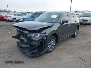 2023 Mazda CX-5 2.5 S Select Package with VIN JM3KFBBM1P0143222, listed as a IAAI auction lot 41933031 with 22,251 mi miles. Bid and sale history available at carsss.com. Image 17.