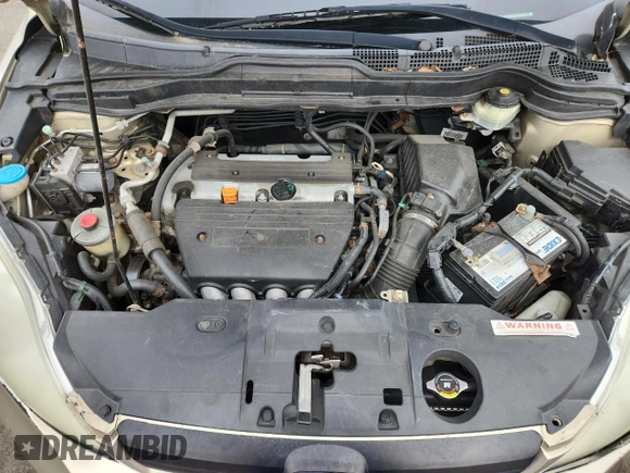 2009 Honda CR-V LX z VIN 5J6RE48309L006028, wystawiony jako Copart lot #58186465 z przebiegiem 214 896 mil mil oraz Szkoda całkowita • Salvage title. Historia ofert i sprzedaży dostępna na DreamBid. Obrazek 12.