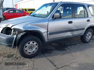 2000 Honda CR-V LX with VIN JHLRD184XYC054038, listed as a IAAI auction lot 41414445 with 294,210 mi miles. Bid and sale history available at carsss.com. Image 6.
