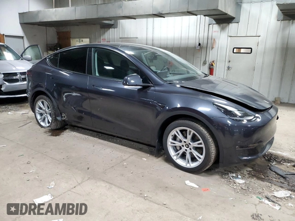 2024 Tesla Model Y Long Range with VIN 7SAYGDEE1RA254860, listed as a Copart auction lot 50750225 with 12,343 mi miles and Salvage Title. Bid and sale history available at DreamBid. Image 4.
