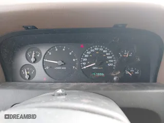 2002 Jeep Grand Cherokee Laredo with VIN 1J4GW48S32C123720, listed as a IAAI auction lot 41909204 with 157,996 mi miles. Bid and sale history available at carsss.com. Image 7.