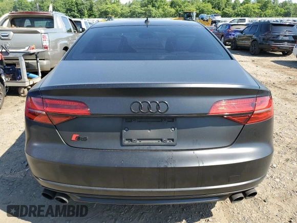 2015 Audi S8 z VIN WAUK2AFD3FN015524, wystawiony jako Copart lot #58506754 z przebiegiem 69 866 mil mil oraz Szkody całkowita. Historia ofert i sprzedaży dostępna na DreamBid. Obrazek 6.