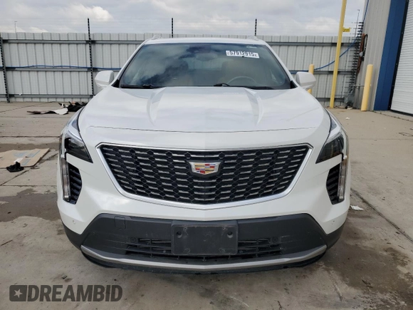 2019 Cadillac XT4 FWD Premium Luxury with VIN 1GYFZCR43KF151044, listed as a Copart auction lot 57912915 with 71,138 mi miles and Salvage title. Bid and sale history available at DreamBid. Image 5.