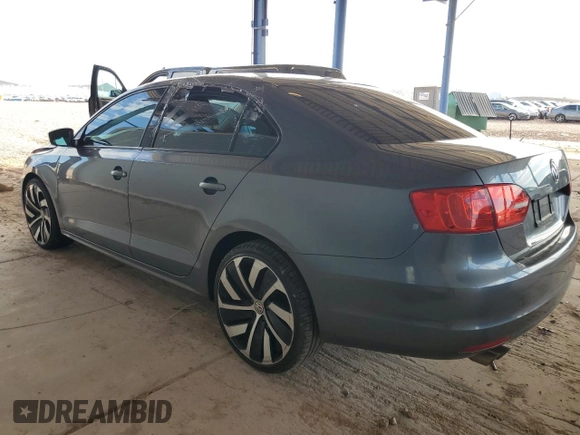 2013 Volkswagen Jetta S with VIN 3VW2K7AJ8DM400911, listed as a Copart auction lot 63826825 with 127,617 mi miles and Salvage title. Bid and sale history available at DreamBid. Image 2.