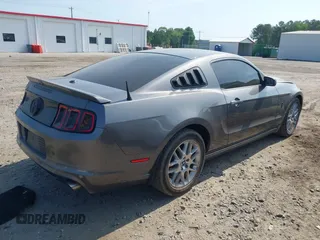 2014 Ford Mustang V6 with VIN 1ZVBP8AM3E5225590, listed as a IAAI auction lot 42148999 with 94,911 mi miles and . Bid and sale history available at DreamBid. Image 4.