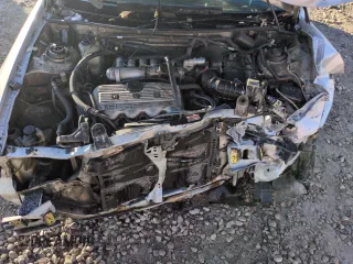 1993 Ford Escort z VIN 1FAPP15J7PW181838, wystawiony jako Copart lot #88717755 z przebiegiem 6 017 mil mil oraz Szkoda całkowita • Salvage title. Historia ofert i sprzedaży dostępna na DreamBid. Obrazek 11.