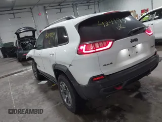2021 Jeep Cherokee Trailhawk with VIN 1C4PJMBX8MD139644, listed as a IAAI auction lot 42419334 with 68,333 mi miles and . Bid and sale history available at DreamBid. Image 3.
