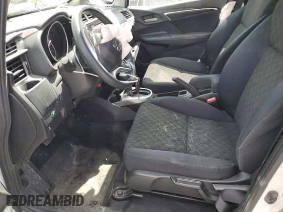 2016 Honda Fit LX z VIN JHMGK5H5XGX027499, wystawiony jako Copart lot #55629475 z przebiegiem Nie podano mil oraz Szkody całkowita. Historia ofert i sprzedaży dostępna na DreamBid. Obrazek 7.