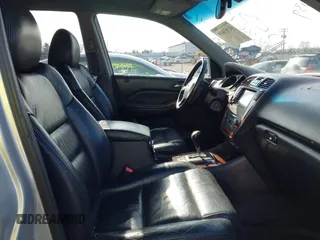 2004 Acura MDX Touring Pkg w/Navigation with VIN 2HNYD18834H534807, listed as a IAAI auction lot 41551039 with 218,827 mi miles. Bid and sale history available at carsss.com. Image 5.