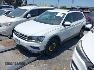 2018 Volkswagen Tiguan S with VIN 3VV1B7AX8JM032990, listed as a IAAI auction lot 42279807 with 74,185 mi miles and . Bid and sale history available at DreamBid. Image 23.
