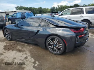 2016 BMW i8 z VIN WBY2Z2C56GV674957, wystawiony jako Copart lot #67001083 z przebiegiem 84 263 mil mil oraz . Historia ofert i sprzedaży dostępna na DreamBid. Obrazek 2.