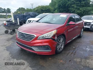 2015 Hyundai Sonata Sport z VIN 5NPE34AB6FH231128, wystawiony jako IAAI lot #42356554 z przebiegiem 177 296 mil mil oraz . Historia ofert i sprzedaży dostępna na DreamBid. Obrazek 2.