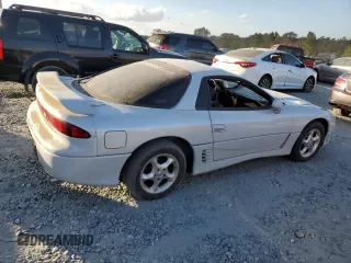 1993 Mitsubishi 3000GT z VIN JA3BM64J4PY006154, wystawiony jako Copart lot #76087934 z przebiegiem 135 641 mil mil oraz Szkody całkowita. Historia ofert i sprzedaży dostępna na DreamBid. Obrazek 3.