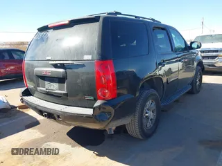 2008 GMC Yukon SLT w/4SB with VIN 1GKFK13038J238439, listed as a IAAI auction lot 41520274 with 265,855 mi miles. Bid and sale history available at carsss.com. Image 4.