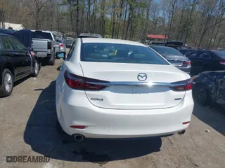 2019 Mazda Mazda6 Touring with VIN JM1GL1VMXK1506052, listed as a IAAI auction lot 41810921 with 60,557 mi miles. Bid and sale history available at carsss.com. Image 17.