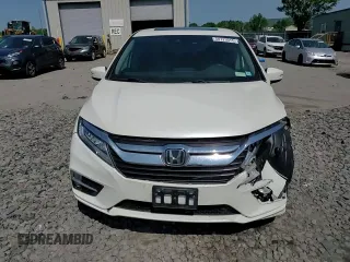 2019 Honda Odyssey Touring with VIN 5FNRL6H81KB051846, listed as a Copart auction lot 58723015 with 68,142 mi miles and Salvage title. Bid and sale history available at DreamBid. Image 14.