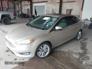 2017 Ford Focus Titanium with VIN 1FADP3J26HL279839, listed as a IAAI auction lot 42466826 with 202,795 mi miles and . Bid and sale history available at DreamBid. Image 17.