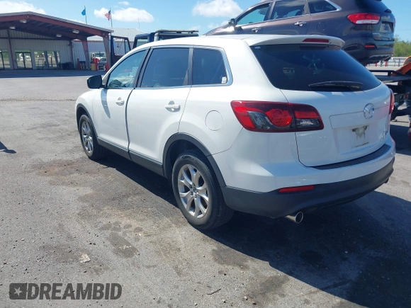 2015 Mazda CX-9 Sport with VIN JM3TB2BV3F0455632, listed as a IAAI auction lot 41881026 with 102,201 mi miles and . Bid and sale history available at carsss.com. Image 3.